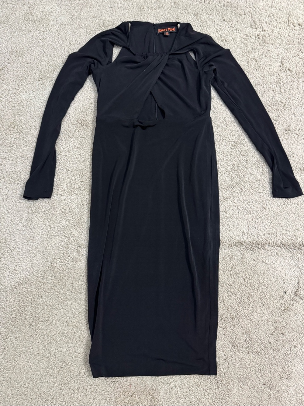 Black Long Sleeve Midi Dress by Dance Marvel. Pretty cut outs